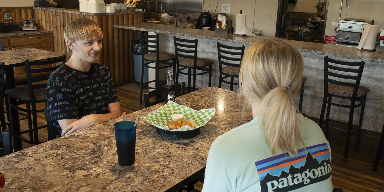Grazers Restaurant couple getting food