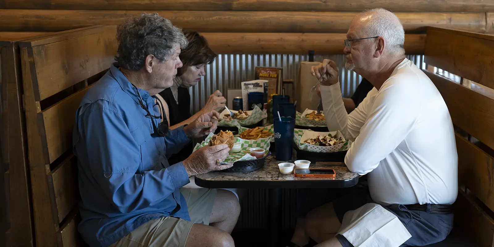 Grazers Restaurant group eating in booth